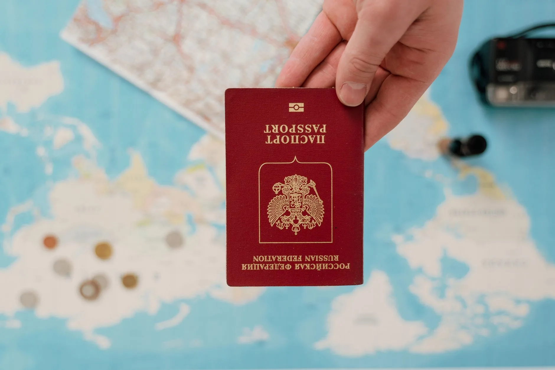 passport and world map travel planning